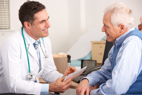 doctor talking to senior man