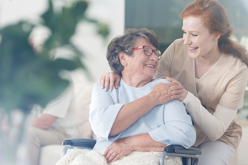 happy patient holding caregiver