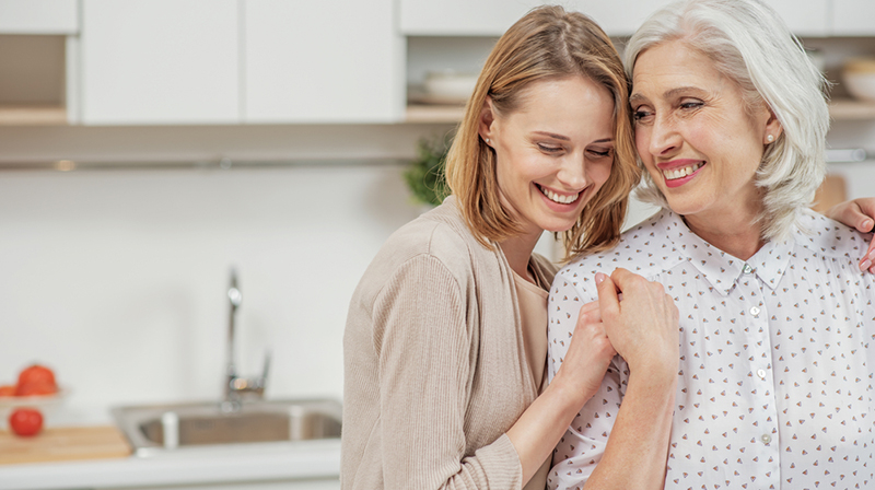 mom daughter embracing